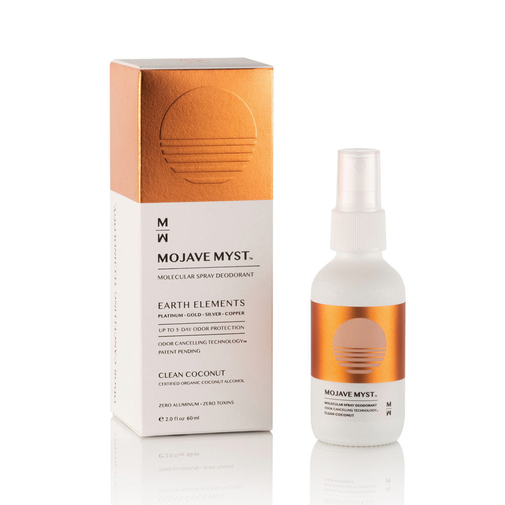 
                  
                    A luxury box of Mojave Myst Molecular Spray Deodorant with a spray bottle next to it on a white reflective surface.
                  
                