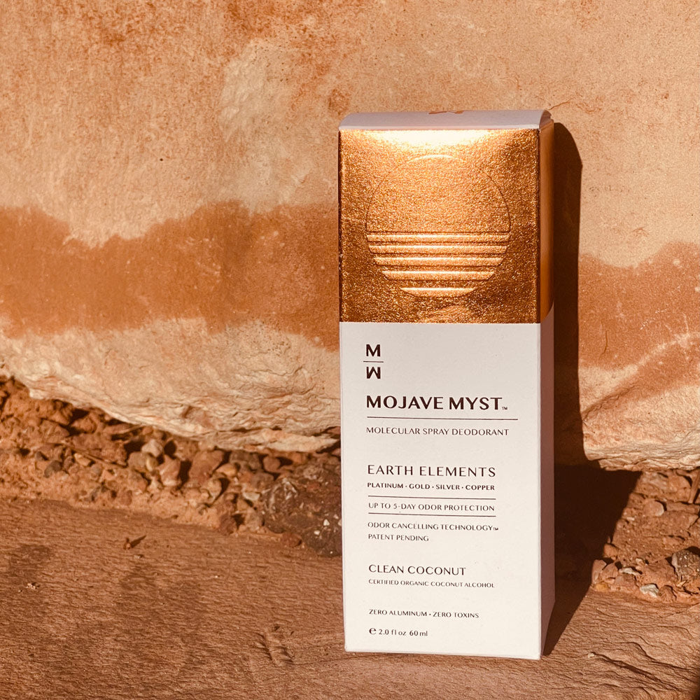 
                  
                    A luxury box of Mojave Myst Molecular Spray Deodorant on red rock surface with a red rock behind it.
                  
                